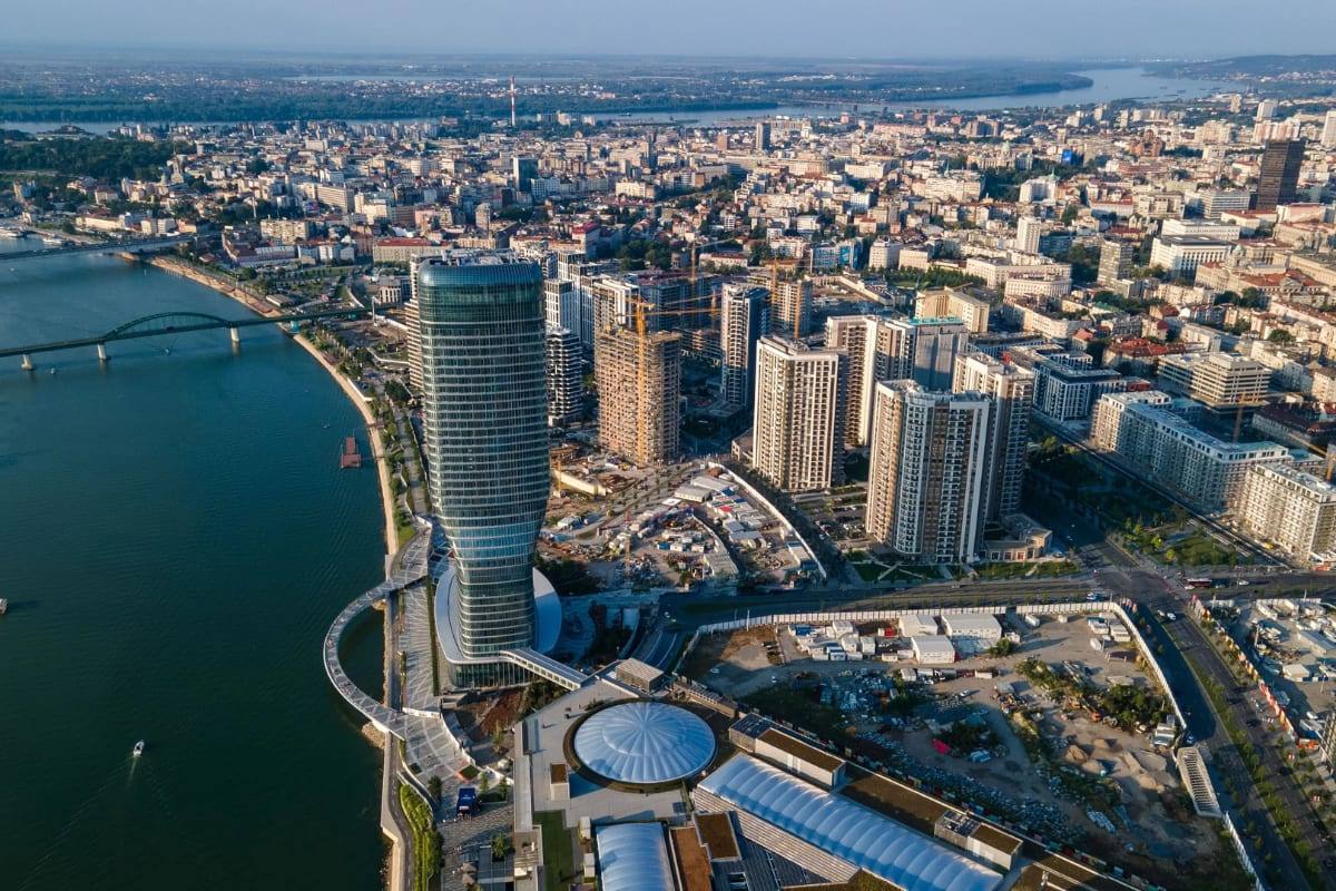 An aerial view of the Belgrade Waterfront tower and riverside districts along the Sava and Danube, Belgrade, Serbia