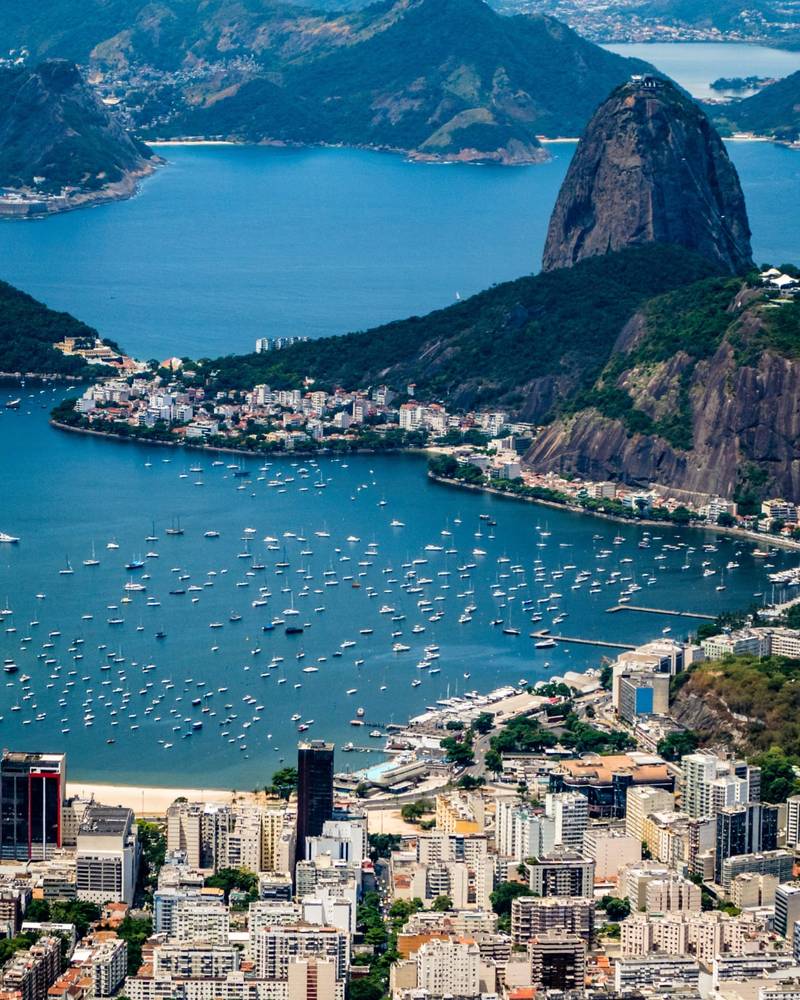 Sugarloaf Mountain rising over Botafogo Bay in Rio de Janeiro, Brazil