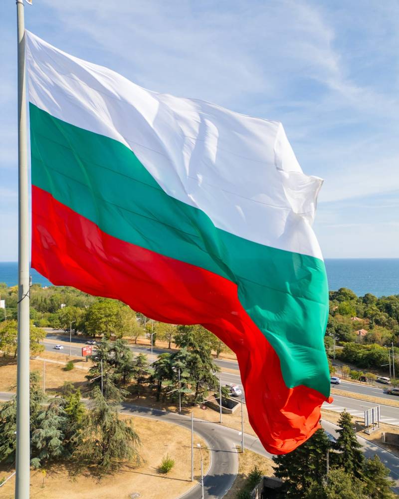 A giant Bulgarian flag flying above the Black Sea coast, Bulgaria