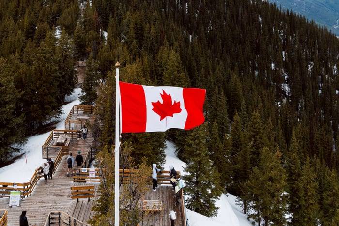 The Canadian flag on the Sulphur Mountain boardwalk above Banff, Canada
