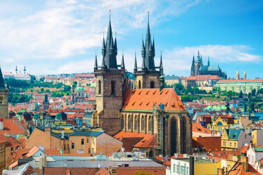 The spires of the Tyn Church with Prague Castle beyond, Czech Republic