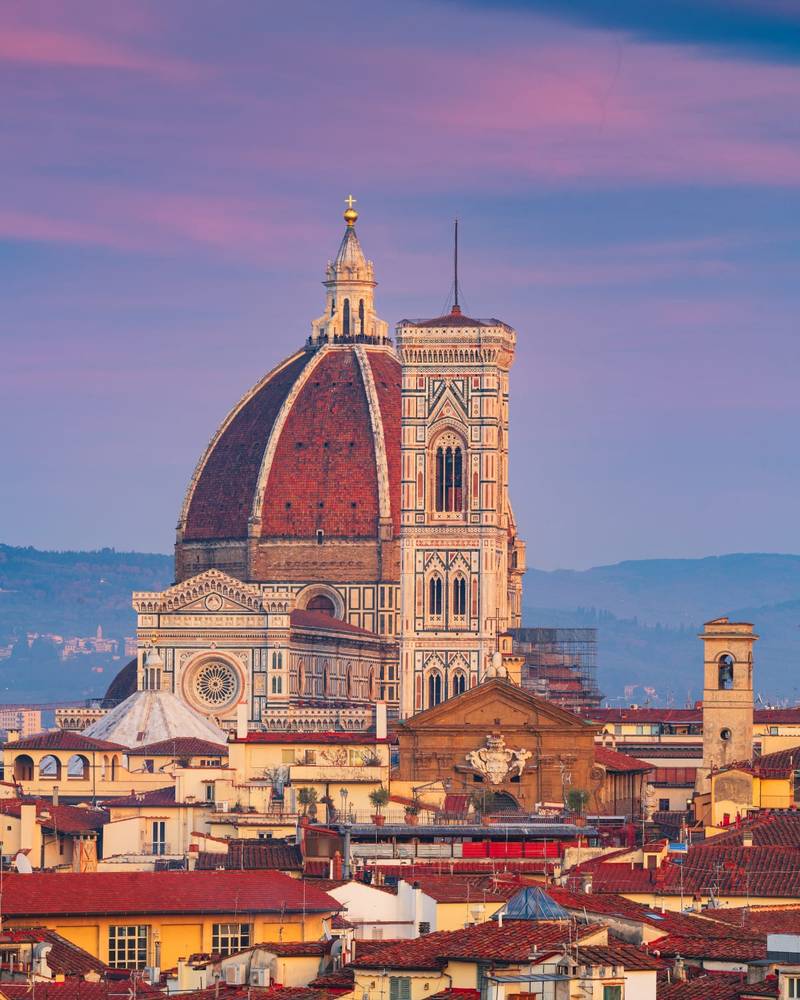 The dome and campanile of Florence Cathedral rising above the city, Italy