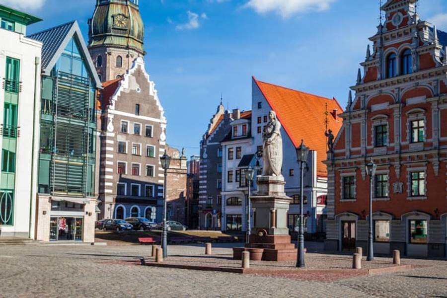 The old town square of Riga with St. Peter's spire and the House of Blackheads, Latvia