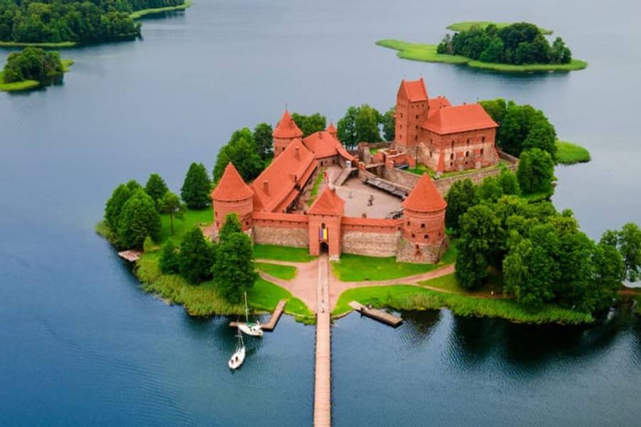 The red-brick Trakai Island Castle on its lake, Lithuania