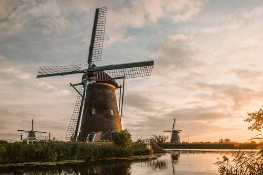 The historic windmills of Kinderdijk at sunset, Netherlands