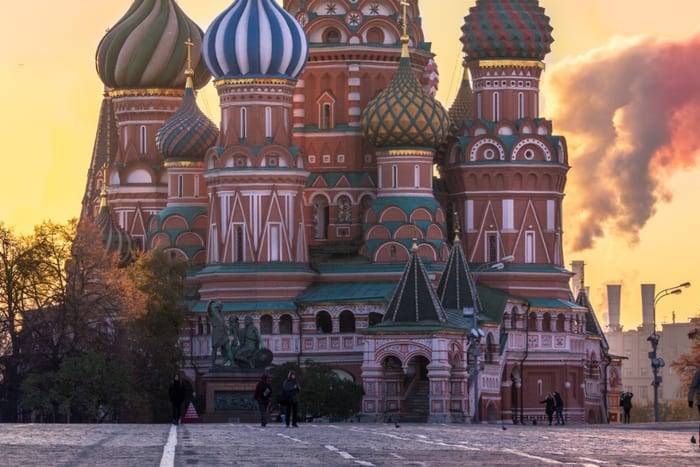 The colourful domes of Saint Basil's Cathedral on Red Square at sunset, Moscow, Russia