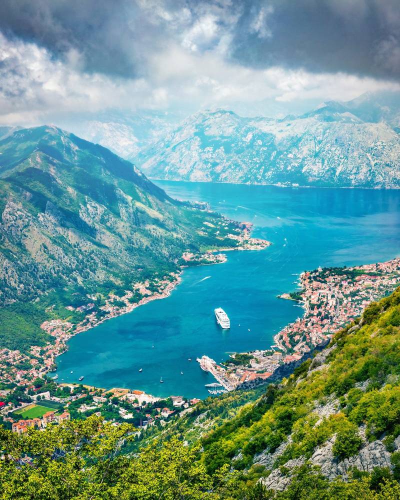 Aerial view of the Bay of Kotor with a cruise ship among the mountains, Montenegro