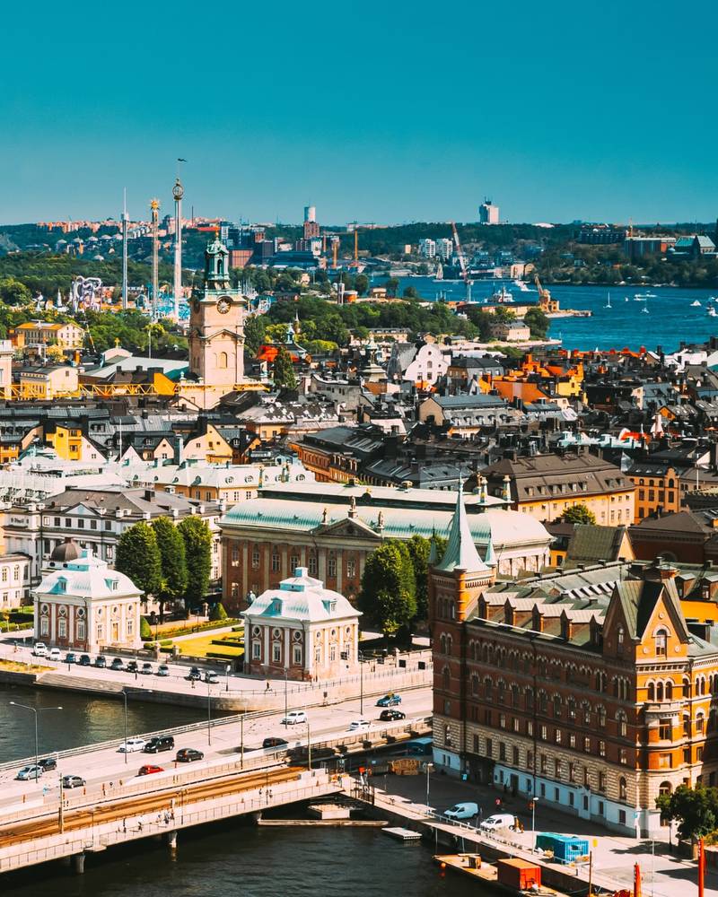 The waterfront and old-town spires of Gamla Stan in Stockholm, Sweden