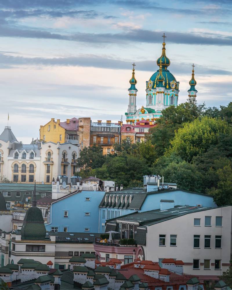 St. Andrew's Church above the old rooftops of Kyiv, Ukraine